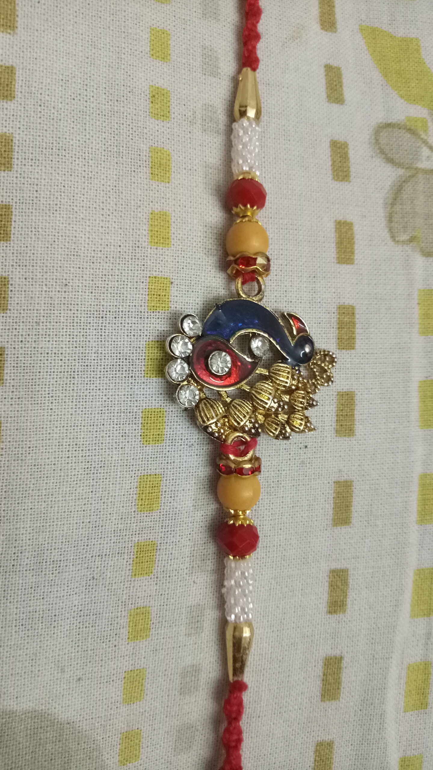 Peacock Metallic Rakhi with Beads - Image 2