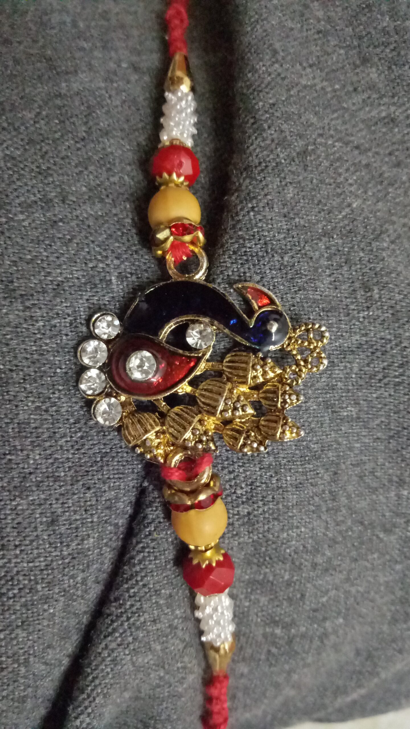 Peacock Metallic Rakhi with Beads - Image 3
