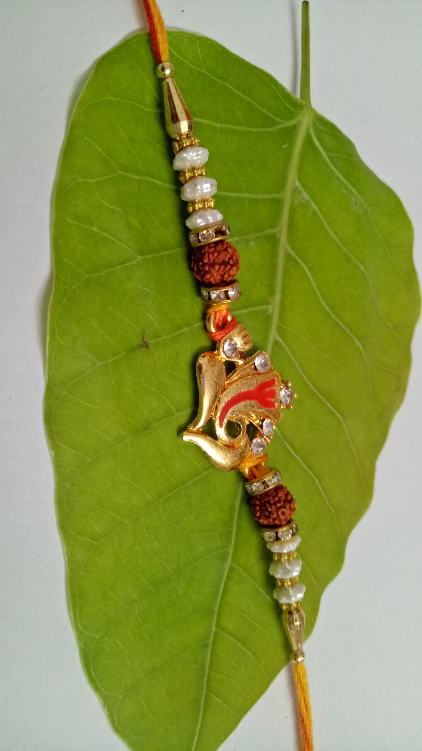 Metallic Ganesha Rakhi - Image 2